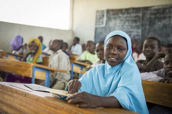 Young students sitting in class. 