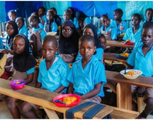 During a lunch break at Maple Leaf Transitional Learning Centre, Wassa in Abuja.
