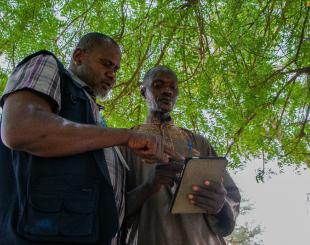 Some government officials checking the food stocks at a school in Zinder region.