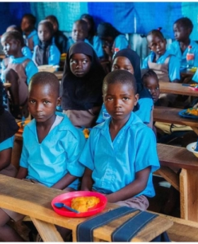 During a lunch break at Maple Leaf Transitional Learning Centre, Wassa in Abuja.