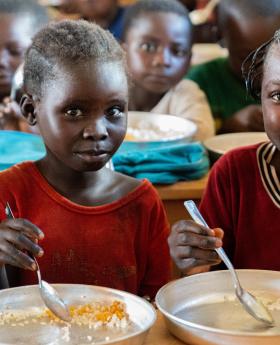 Children enjoy their lunch meal at a school in CAR