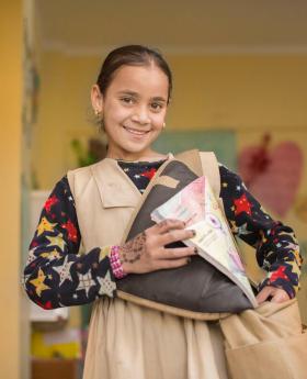 Girl getting ready for school in Egypt