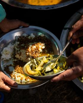 A photo of a plate of food, part of the school meals provided to kids in Nepal