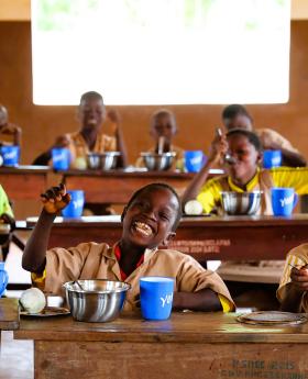 Kids enjoying their school meals 